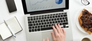 hands-working-laptop-with-diagram-it_1163-2755 - Copy
